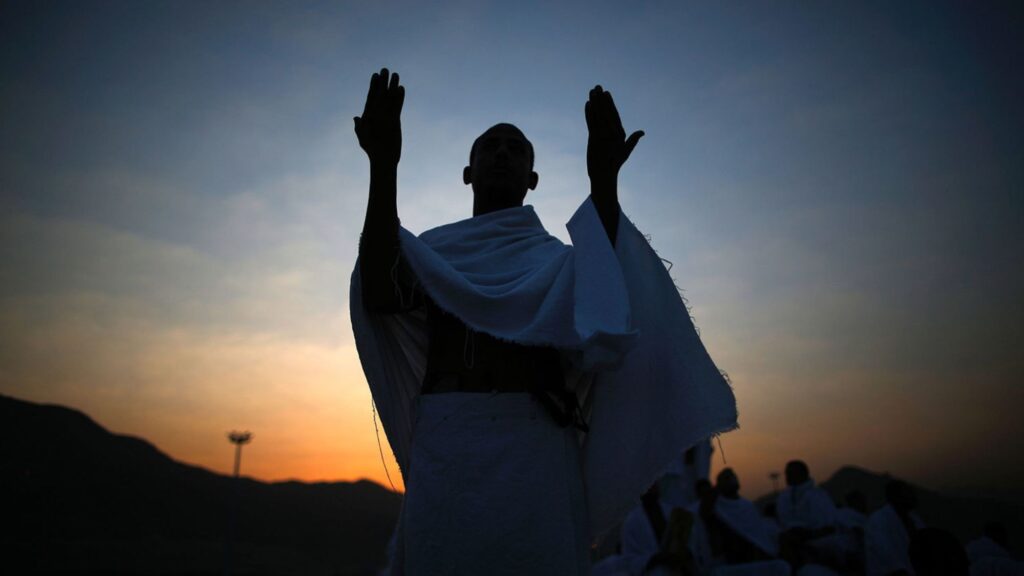 A man praying during his holy journey of Umrah