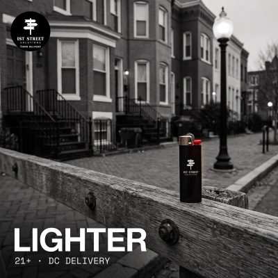 1st Street lighter on a weathered wooden rail on a black-and-white DC rowhouse street